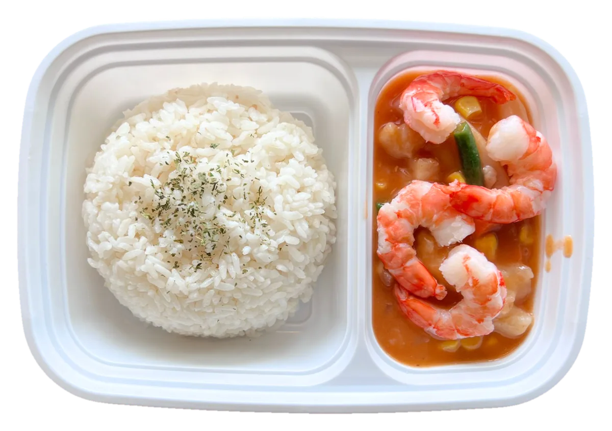 Tomato Seafood rice box with shrimp, fish, and squid in tomato sauce